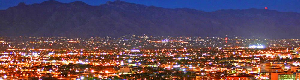 Duffy Electric with Tucson Skyline at Night