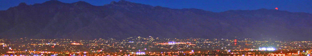 Duffy Electric with Tucson Skyline at Night